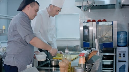 Chef Preparing Food in Commercial Kitchen