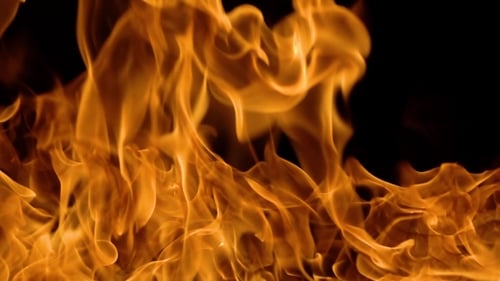 Close-up Shot of Fiery Dancing Flames on Black