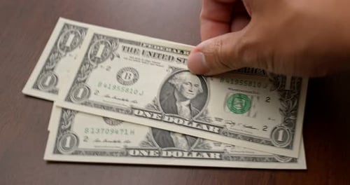Counting USD banknote