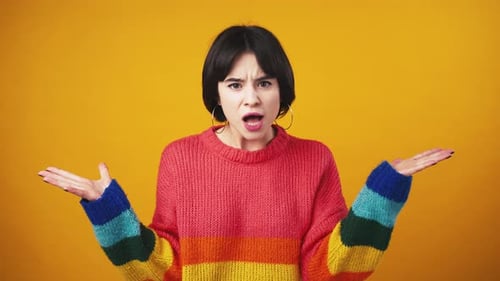Young Annoyed Lady Looking Around and Resenting Feeling Disturbed and Puzzled Orange Studio