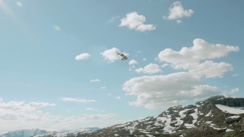 Helicopter Over the Mountains in Norway