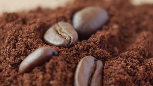 Coffee Beans on Ground Coffee.