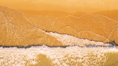 Aerial View Small Waves on Sandy Beach