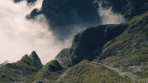Aerial View of the Canyon and Mountains with Clouds