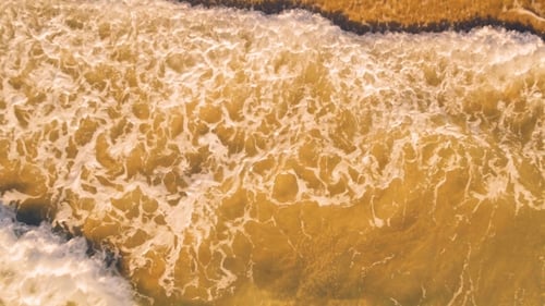 Aerial View Small Waves on Sandy Beach