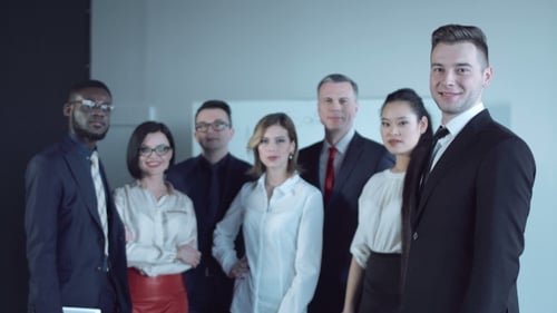 Adult Businessman and Office Team