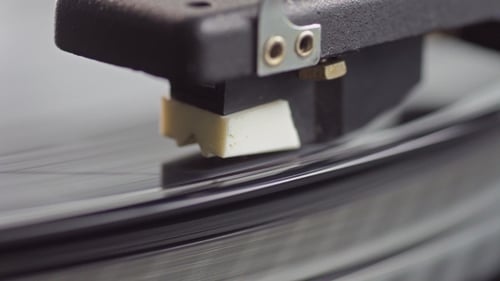 Record Player Needle on Vinyl Spinning Close Up