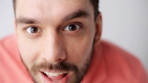 Smiling Man Extreme Close Up Portrait Indoors