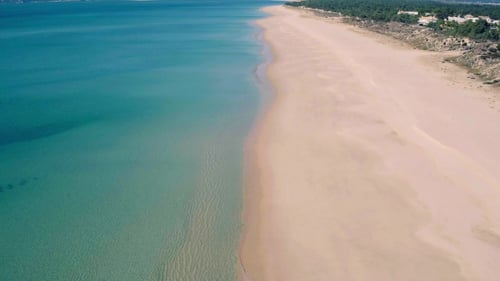 Aerial View Small Waves on Sandy Beach
