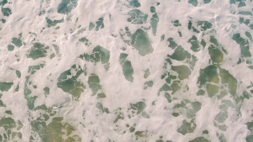 Aerial View Small Waves on Sandy Beach