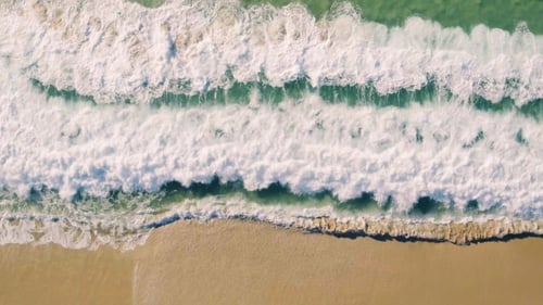 Aerial View Small Waves on Sandy Beach