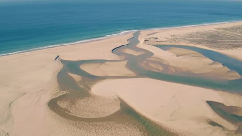 Aerial View Above Ocean Beach with Lagoon