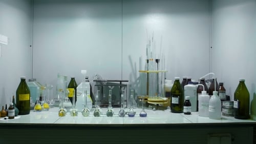 Laboratory Glassware with Scientific Equipment