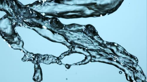 Water pouring and splashing in ultra slow motion 1500fps on a reflective surface - WATER POURS