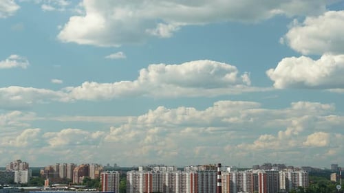 City with Cloud Pass Over Buildings and Skyscrapers - Time Lapse