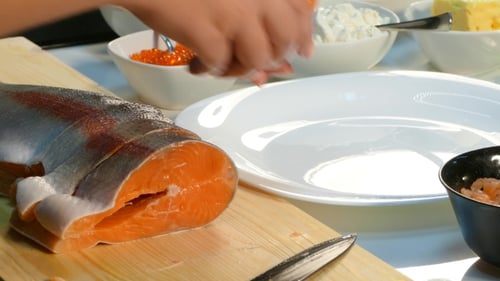 Video. Cook Cuts Salmon Steaks.