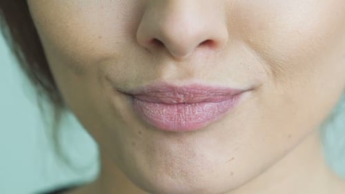 Woman's Lips Moving in Extreme Close Up