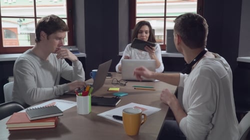 Collaborative Team Working Together in a Modern Office