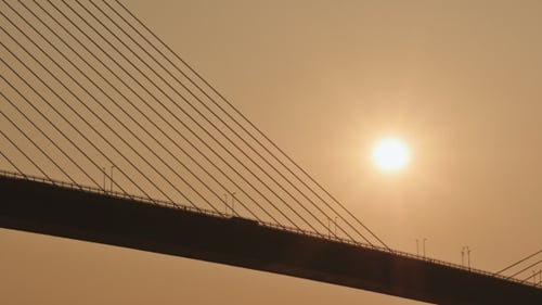 Steel Cables of the Bridge Against the Sunset. Bridge in Ha Long City.