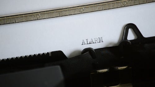 Typing the Word ALARM with an Old Manual Typewriter