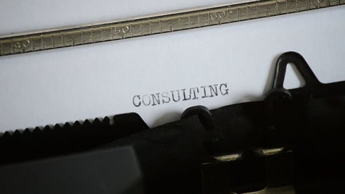 Typing the Word CONSULTING with an Old Manual Typewriter