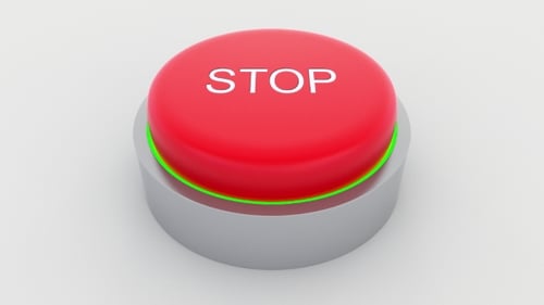 Big Red Button with Stop Inscription Being Pushed