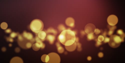 Shimmering Golden Bokeh Lights Flowing Particles Background