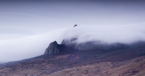Mist Cover the Peak and Expand Over the Valley