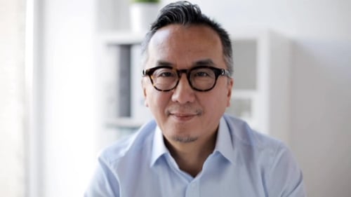 Happy Smiling Asian Businessman at Office 23