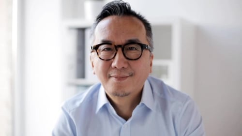 Happy Smiling Asian Businessman at Office 25