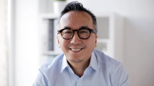 Happy Smiling Asian Businessman at Office 26