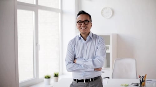 Happy Smiling Asian Businessman at Office 47