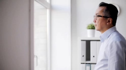 Businessman Thinking at Office 45