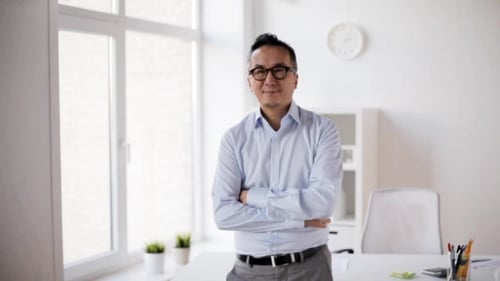 Happy Smiling Asian Businessman at Office 46