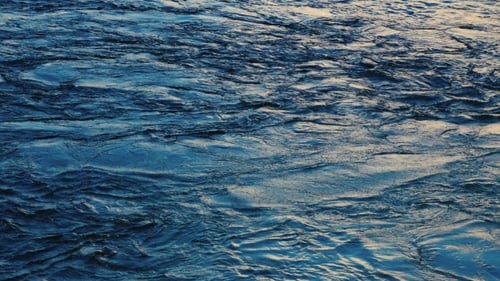 Water Ripples Gently in Fading Daylight