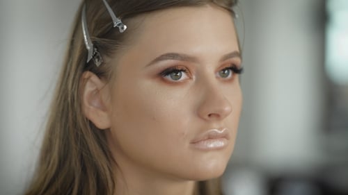 Woman Getting Eye Makeup Applied with Brush, Close Up