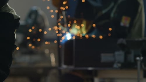 Welder Works with Welding Machine in Darkness