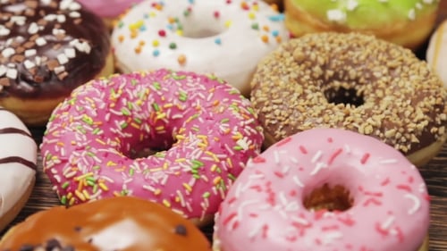 Delicious Colorful Assortment of Frosted Donuts