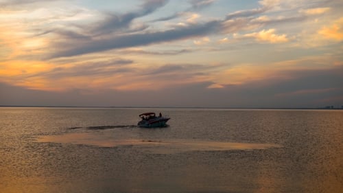 Large Luxury Yacht Silhouette at Sunset on Ocean. Beautiful Life, a Weekend on Your Own Yacht. Quiet