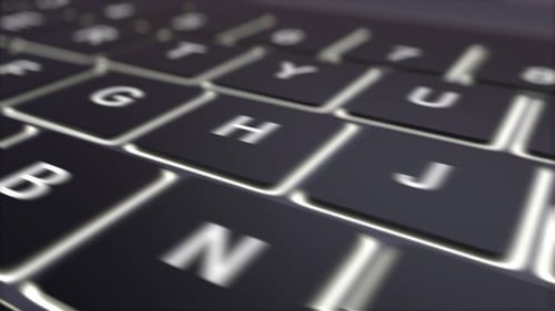 Schwarze Computertastatur und leuchtende Download-Taste