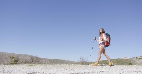 Young Female Tourist Walking
