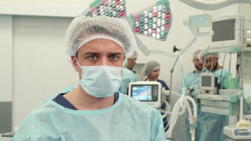 Surgeon Poses at the Surgery Room