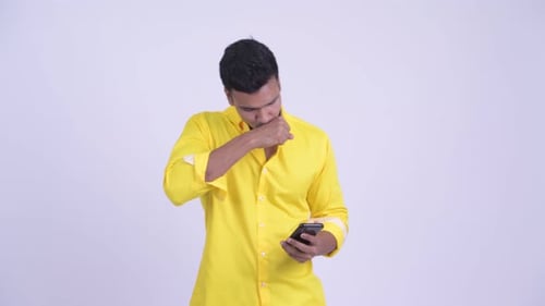 Man Upset After Using Smartphone