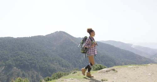 Female Traveler Backpacking in Summer