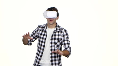 Man Experiencing Virtual Reality with Headset