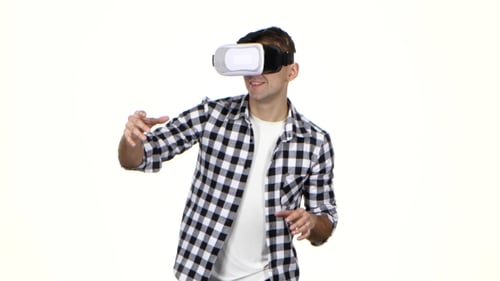 Man Using Virtual Reality Headset on White Background