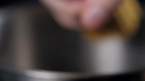 Uncooked Spaghetti Resting in a Metal Bowl