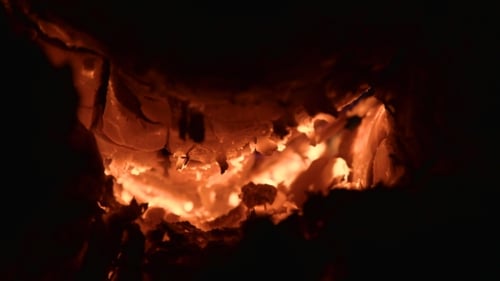 Intense Glowing Embers Burning in the Night
