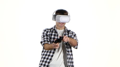 Man with VR Headset and Controller Gaming