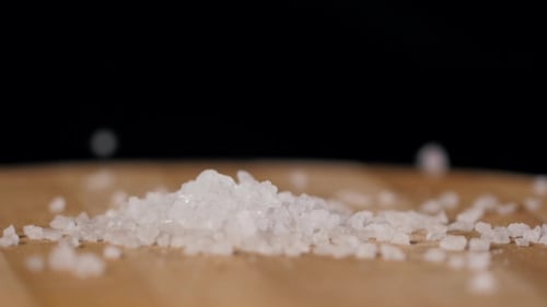 Sea Salt Over Wooden Background